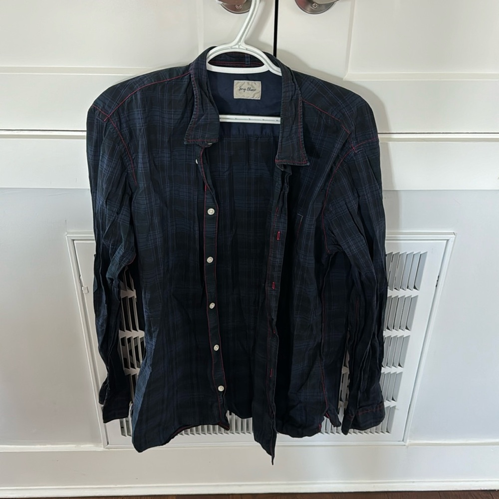 Serge Blanco. Men’s, blue w/ red stitching button down.